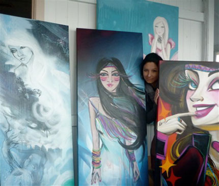 Maryanne with some of her paintings